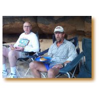 Picture of Bill Huggins and Scotty Stevens enjoying dinner.
